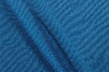 Fototapeta premium Silky blue organza fabric with a fine, open weave and distinctive texture pattern. Ideal for luxurious creations, this material is denser and crisper than traditional silk gauze.