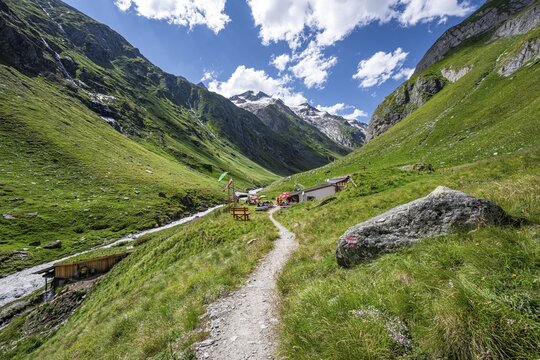 Mountain hut Clarah&uuml;tte, Umbaltal with mountain stream Isel, glaciated mountain peaks in the background, Venediger Group, Hohe Tauern National Park, East Tyrol, Tyrol, Austria