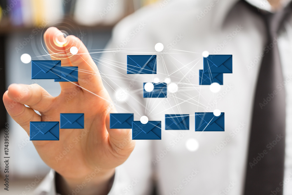 Wall mural modern businessman interacts with digital email network. concept of global communication and network