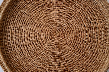 Fototapeta premium Circular woven wicker design texture or backdrop