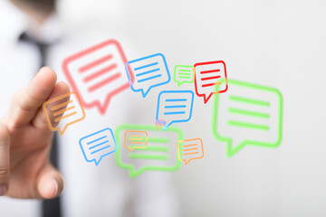 Abstract messaging concept showing communication with speech bubbles floating. Business and personal interactions concept.