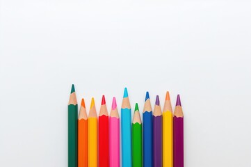 Collection of vibrant colored pencils against a white backdrop