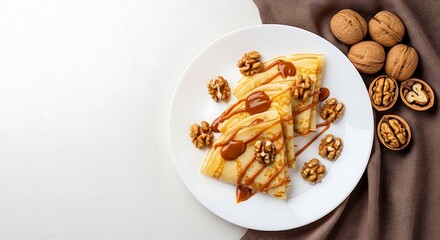 Delicious Walnut Crepes with Caramel Sauce.