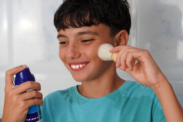 adolescence, hygiene, and personal care. Teenager with a shaving brush and shaving cream