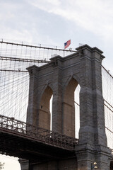 Naklejka premium Brooklyn Bridge with American Flag