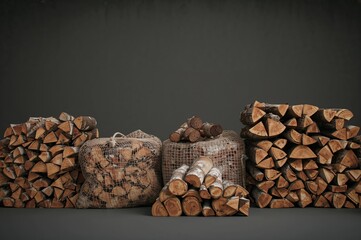 Bundles of chopped wood in mesh bags