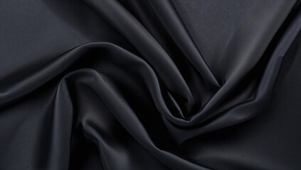 Fototapeta premium Elegant dark grey silk or satin fabric texture for a luxurious abstract backdrop