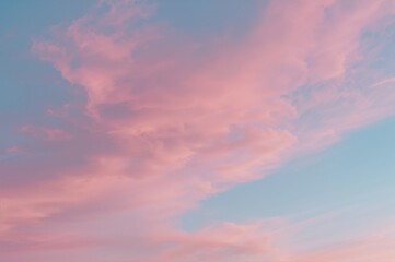 Sunset backdrop featuring pastel clouds in shades of pink and blue with a soft light effect