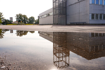 A close-up of a puddle on parking lot