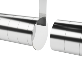 Abrasive cutoff wheel slicing through a chrome metal cylinder on a transparent background