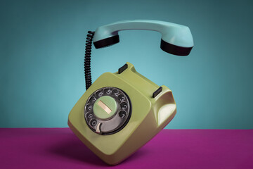 Retro Rotary Telephone with Taken off Receiver. Vintage Communication Concept, Classic Landline Handset, Nostalgic Technology, Creative Pop Art Style Still Life