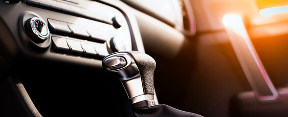 Blue business car with shiny front lights color bright