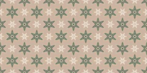 Vector seamless pattern with cute Christmas snowflake stars. Modern geometric holiday texture with decorative ornamental crystals. Winter festive background. Design for textile, wrap, decor, print