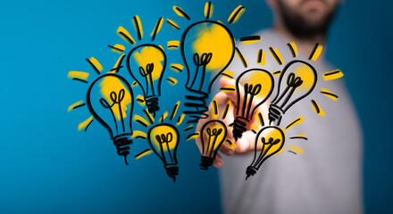 Hand interacting with glowing light bulbs, symbolizing ideas, innovation, and creativity. Perfect for business and technology.