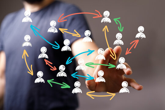 Close-up of a man's hand reaching out, palm open.  Perfect for concepts of invitation, connection, help, or offering.