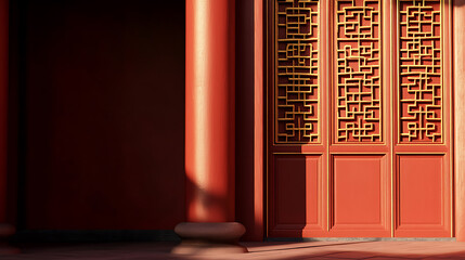 Fototapeta premium Architectural detail of an Asian-inspired building featuring red pillars and a door with geometric latticework, bathed in warm sunlight and shadows.