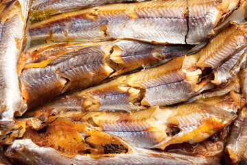 Fried blue whiting fish. Traditionally prepared seafood. 
