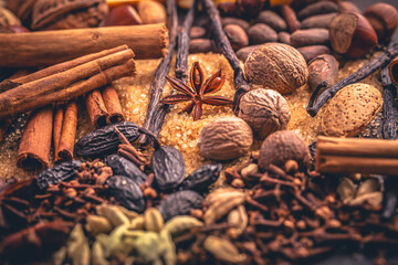 Warm winter spices featuring star anise, cinnamon, dried orange, cloves  and nuts