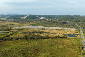 Aerial view of a large solar power plant construction site near Kushiro Wetland, Hokkaido, Japan – Editorial Use Only