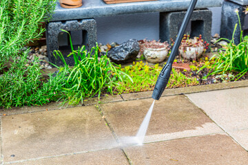 Outdoor floor cleaning with high pressure water jet