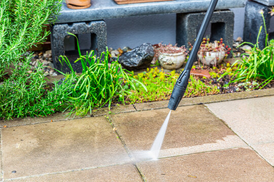 Outdoor floor cleaning with high pressure water jet