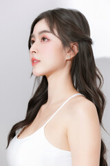 Happy Asian Woman Enjoying Summer with Sun Protection. Sunscreen and UV Care Concept.