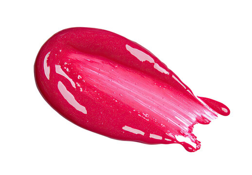 Close-up of vibrant pink lip gloss smear