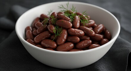 Obraz premium Bowl of Kidney Beans Garnished with Dill.