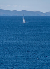 Fototapeta premium Yacht in the sunshine in the Aegean Sea in Greece