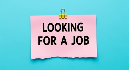 Pink note displays looking for a job message on a blue background