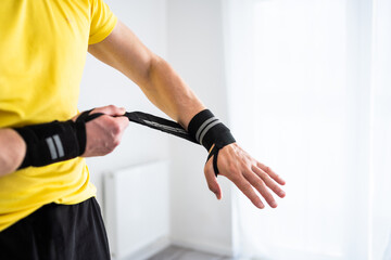 Athlete Man Preparing For Doing Sport At Home