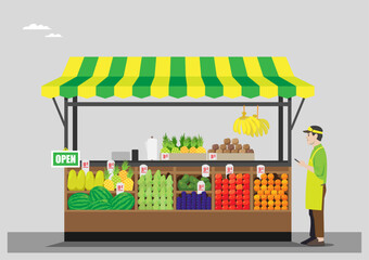 Stand with Vendor and Assorted Fresh Fruit for Sale