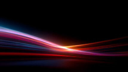 Abstract light trails against a black background
