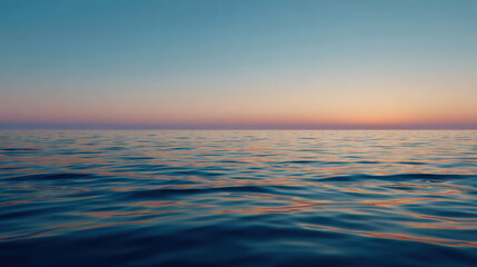 Calm sea at golden hour with serene horizon, reflecting soft colors