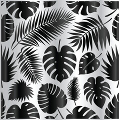 tropical palm and monstera leaves arranged in seamless BACKGROUND