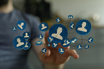 Hand touching social network icons, representing communication, connection and networking concepts. Ideal for business, technology, and social m