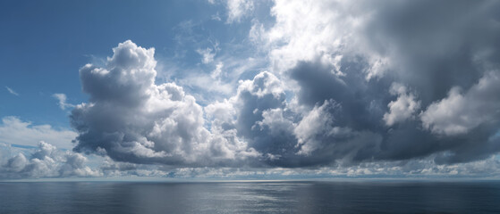 Cloudy sky over ocean with peaceful horizon, showcasing dramatic clouds and serene water