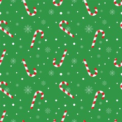 Christmas seamless pattern with red and white candy canes and winter snowflakes isolated on green background.Merry Xmas vector graphic illustration wallpaper.