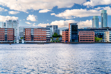 Obraz premium Modern buildings and skyscrapers in Copenhagen, Vesterbro business district. Scandinavian architecture in city, Denmark.