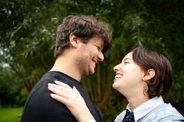 19 yo white couple with male and female holding each other in love, Borchtlombeek, Belgium