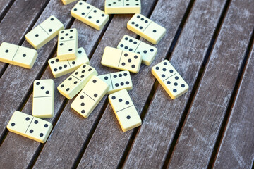 Classic tiles on wooden table closeup	
