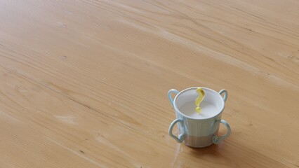 3D Render of a Cup with Floating Question Mark on Wooden Table