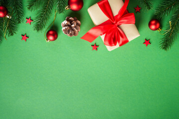 Naklejka premium Christmas flat lay background on green.