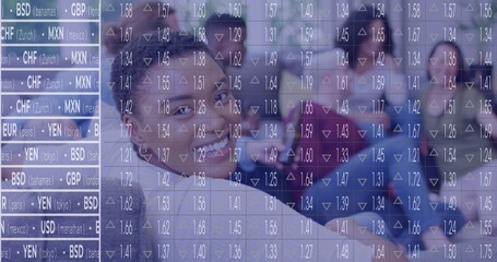 Standing six professionals in business attire reviewing currency rates in office, with rate overlay