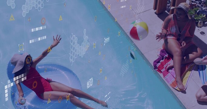 Reclining woman wearing sunhat riding inflatable ring in backyard pool, with beach ball, copy space