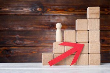 Risk. Red arrow, figure and stacked cubes on white wooden table, space for text