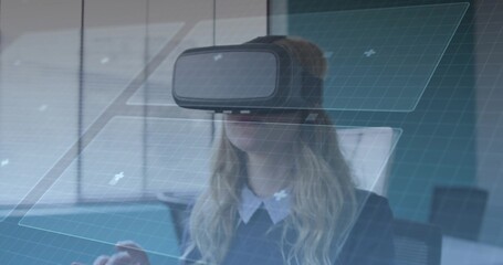 Navigating professional wearing blazer using VR headset at desk, with floating UI panels