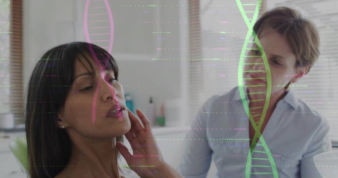 Professional examining patient touching face in green chair at clinic with DNA overlay, copy space - Powered by Adobe
