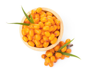 Fresh sea buckthorn berries with green leaves isolated on white, top view