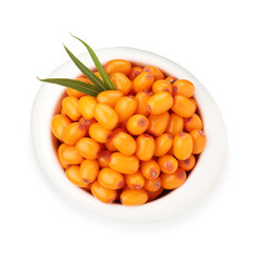 Fresh sea buckthorn berries with green leaves in bowl isolated on white, top view